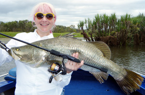 Lesley Mason from Sydney with a nice Corroboree Billabong barra, caught with Obsession Fishing Safaris